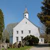 Old Tennent Church is a Presbyterian church located at 448 Tennent Road in Manalapan, New Jersey. The congregation, a member of the Presbyterian Church USA, was founded in 1692 and played a prominent role in the founding of Presbyterianism in America. The current edifice was completed throughout 1751-53 and was named in memory of pastors John Tennent and his brother William Tennent. The Old Tennent Cemetery is located on the same property. It is managed by the Old Tennent Cemetery Association. The church itself is a historic Revolutionary War site. Patriots fought and won victory over the British close by, in the Battle of Monmouth. The church building was used as a temporary hospital for wounded soldiers.